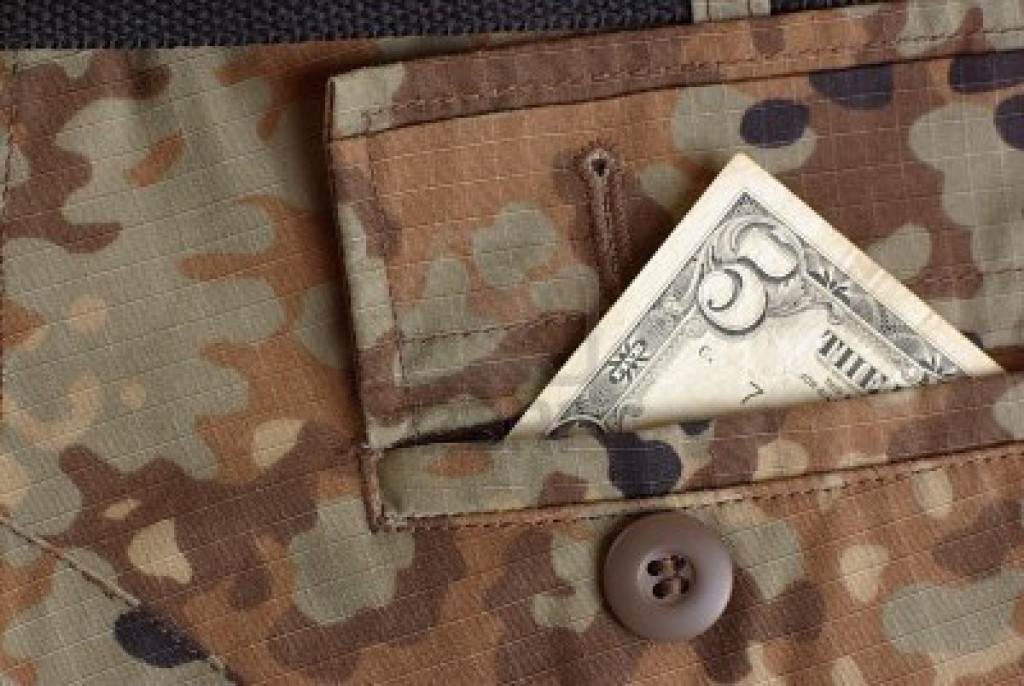 6858857-guerra-y-dinero