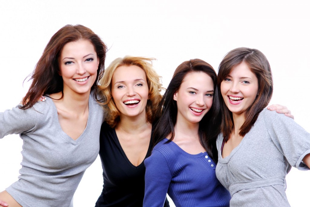 four sexy, beautiful young happy women